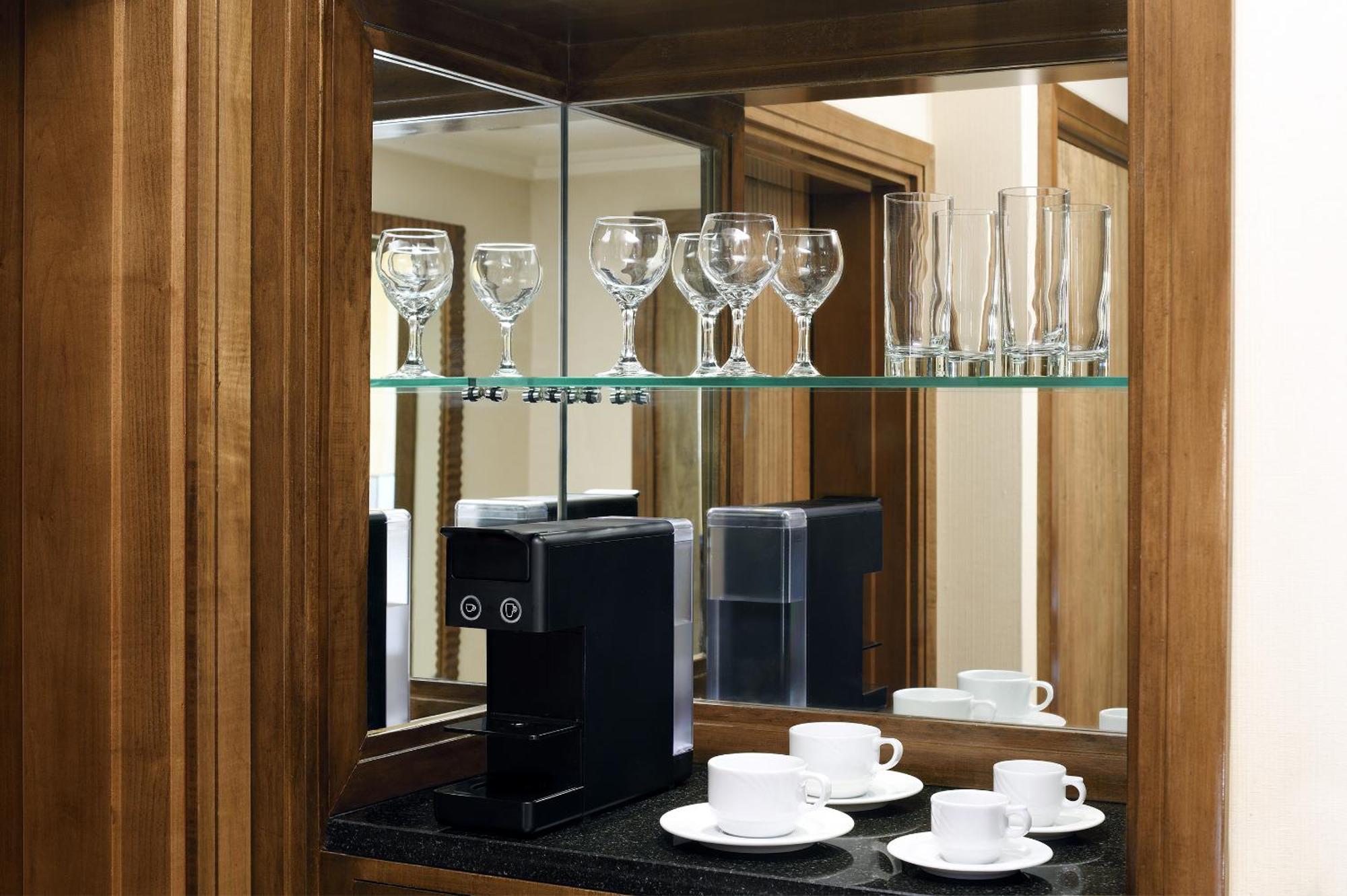 Intercontinental Riyadh By Ihg Экстерьер фото A Nespresso machine in a hotel room